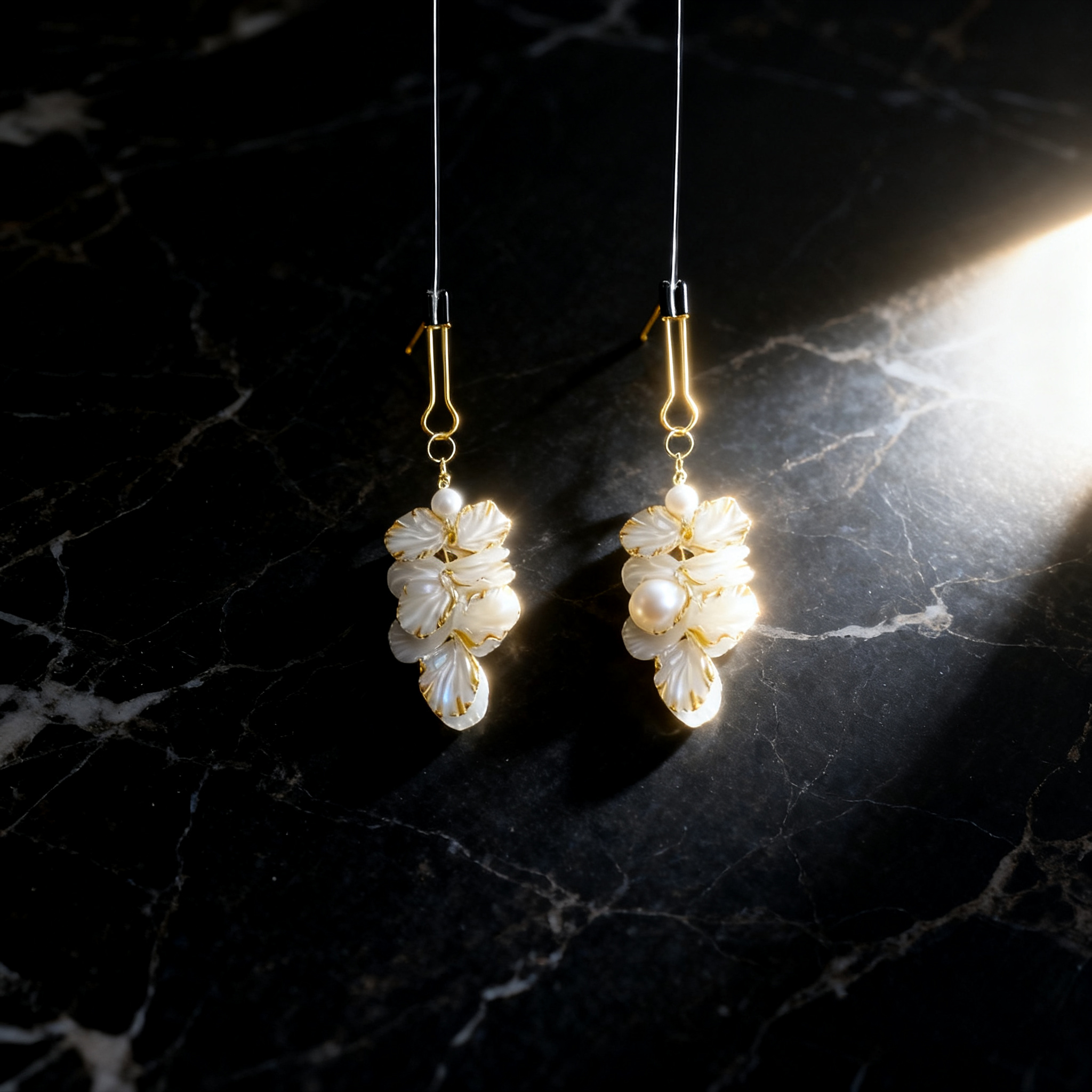 Petal Cascade styled on a dark marble surface